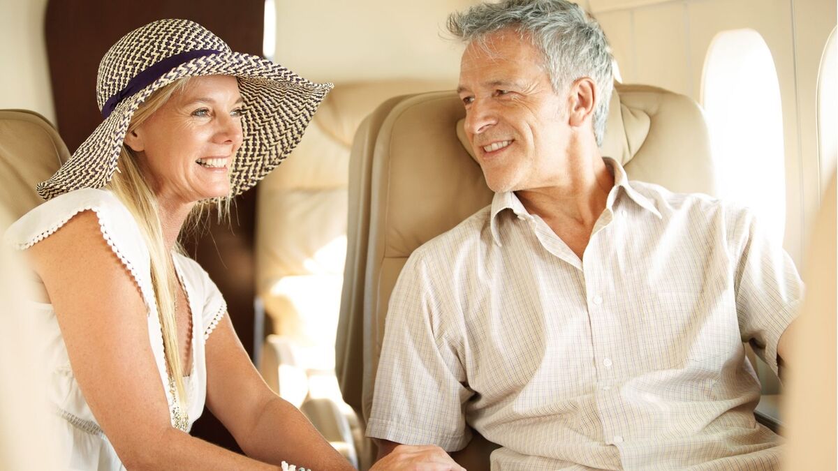 Luxury couple flying private plane