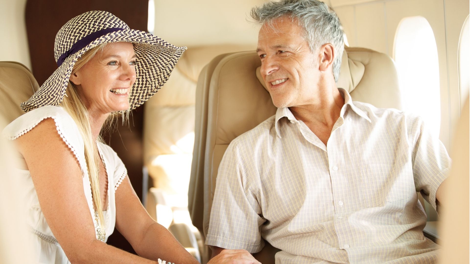 Luxury couple flying private plane