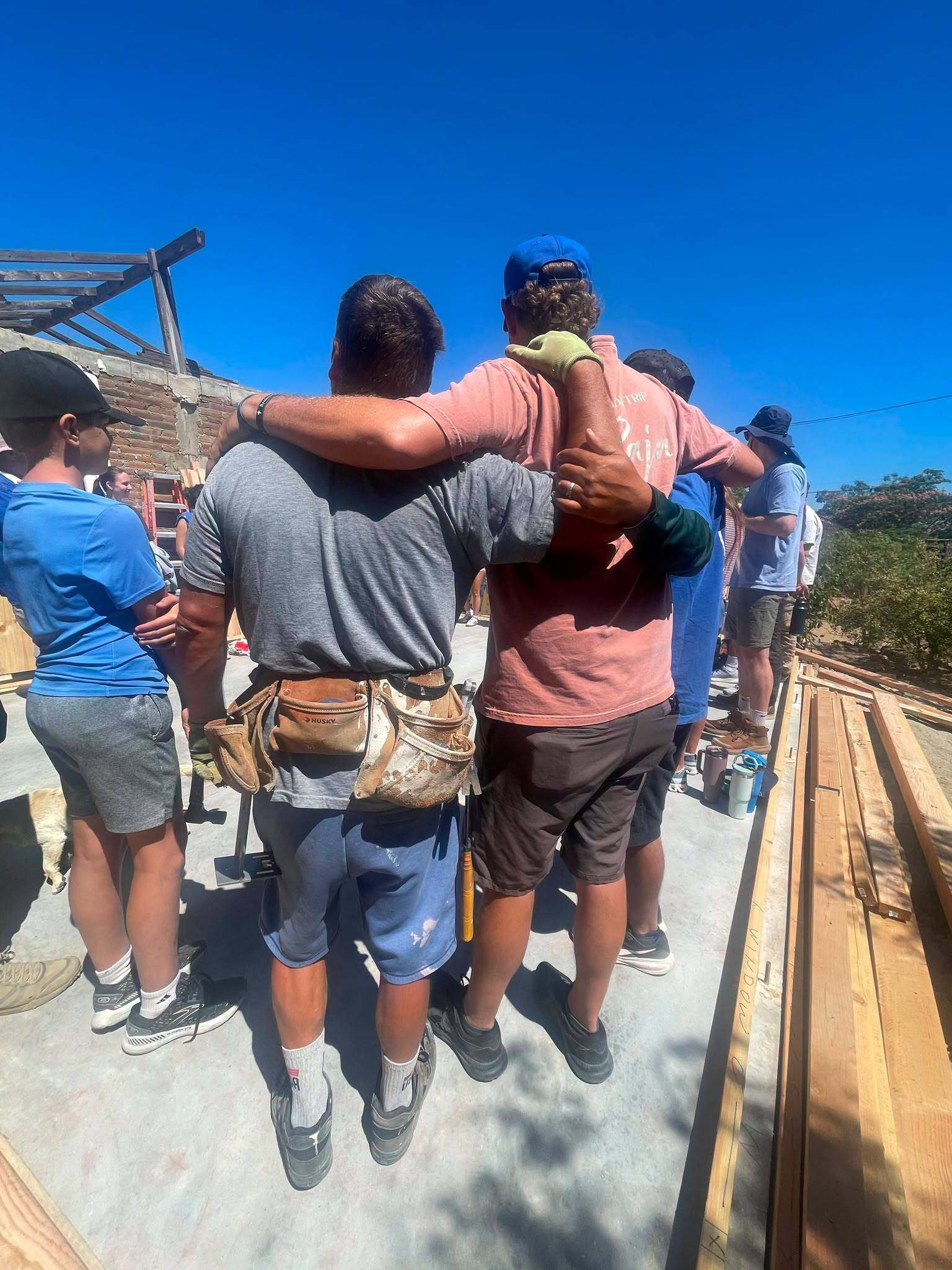 Mission trip team huddled together