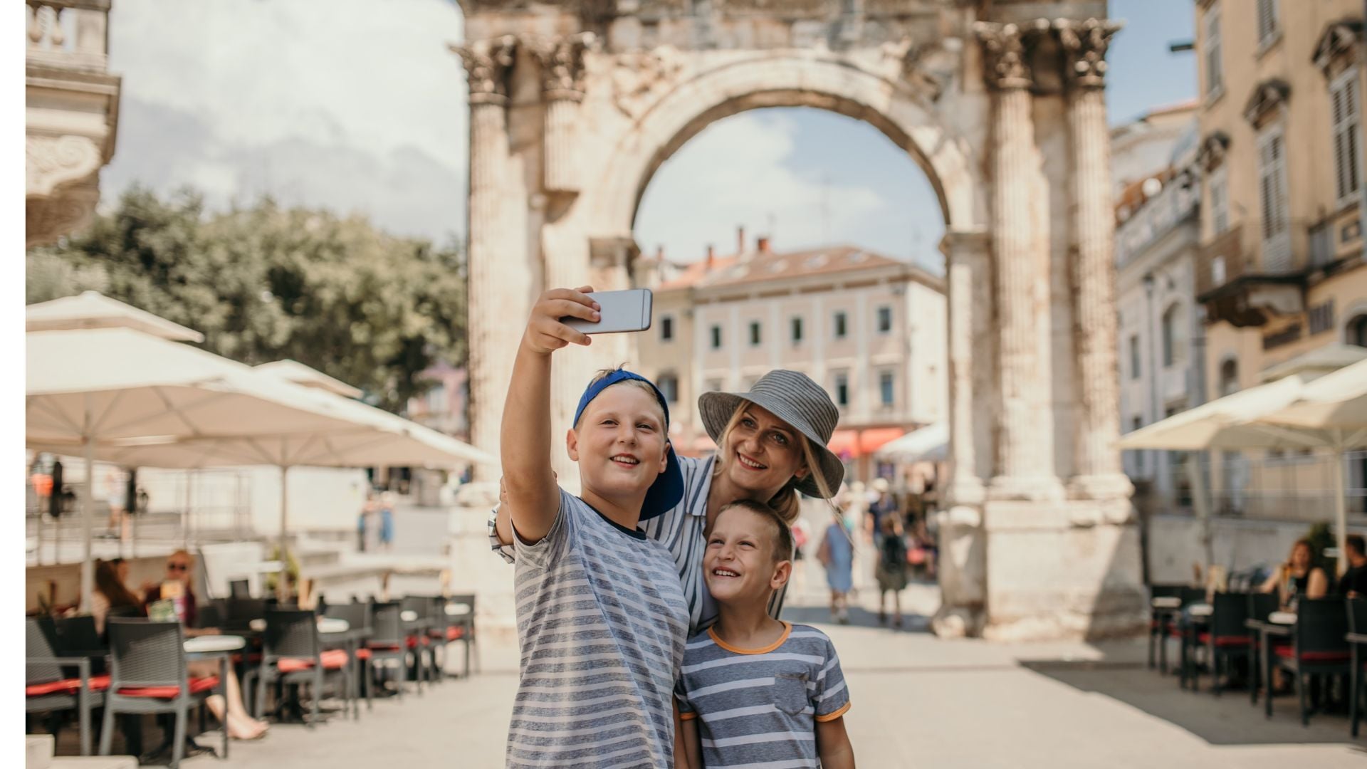 Mother and her 2 kids taking a selfie